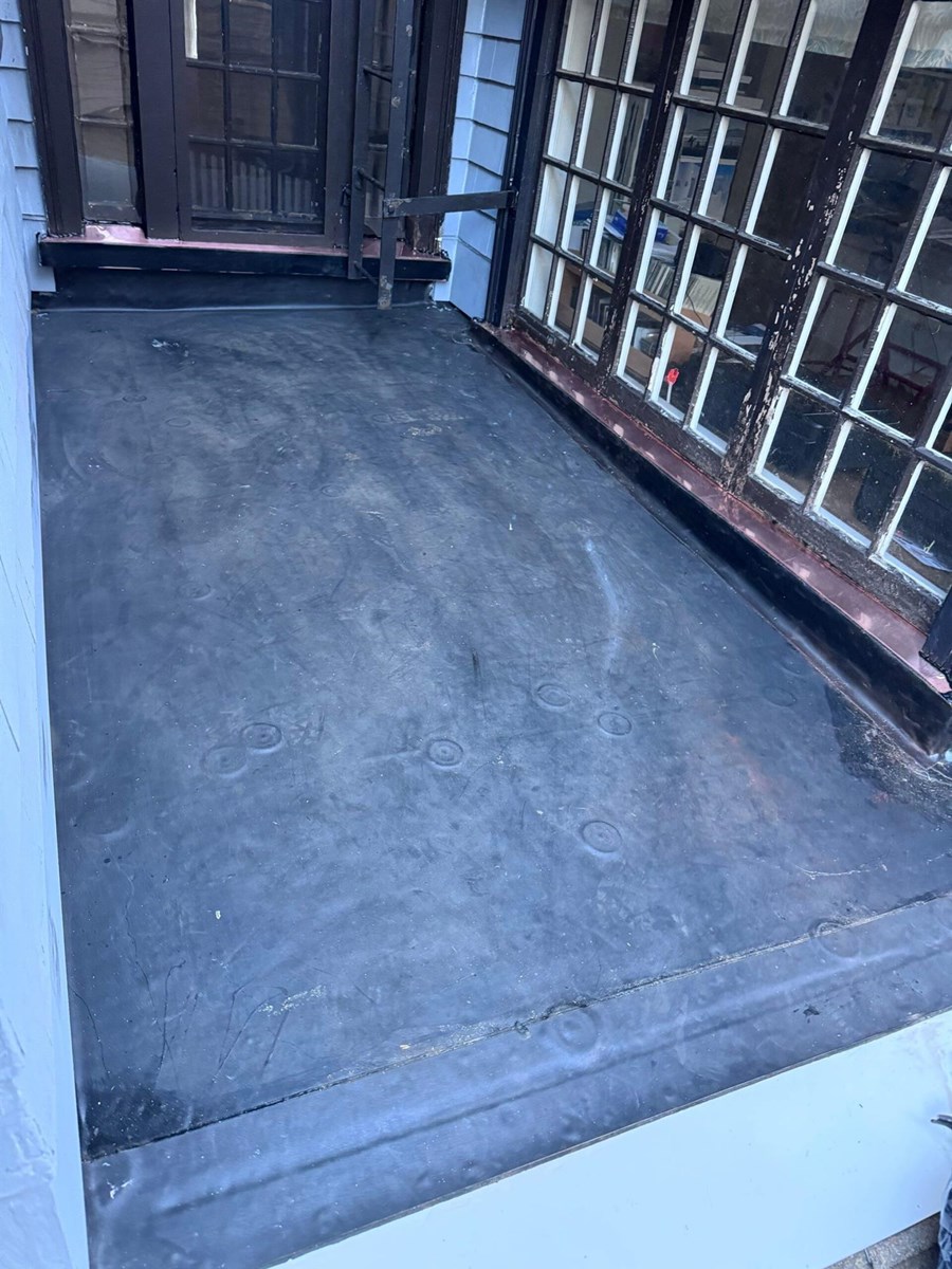 rubber roof replacement services in Massachusetts