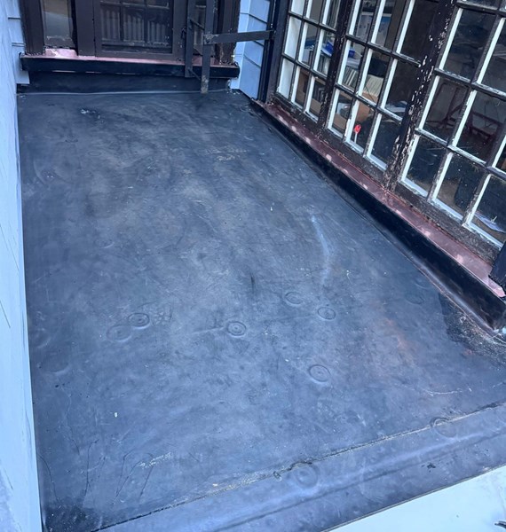 rubber roof replacement services in Massachusetts