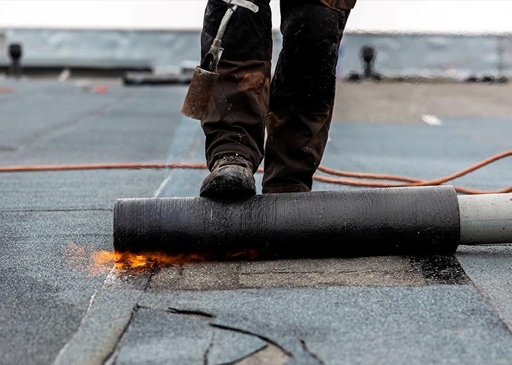 flat roof repair being completed in Westwood