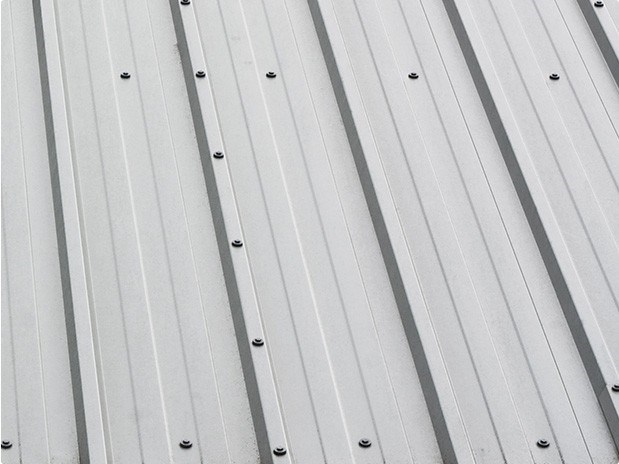 Exposed Fastener Metal Roofing installation in Westwood