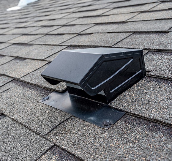 checking ventilation during rood inspection in Westwood