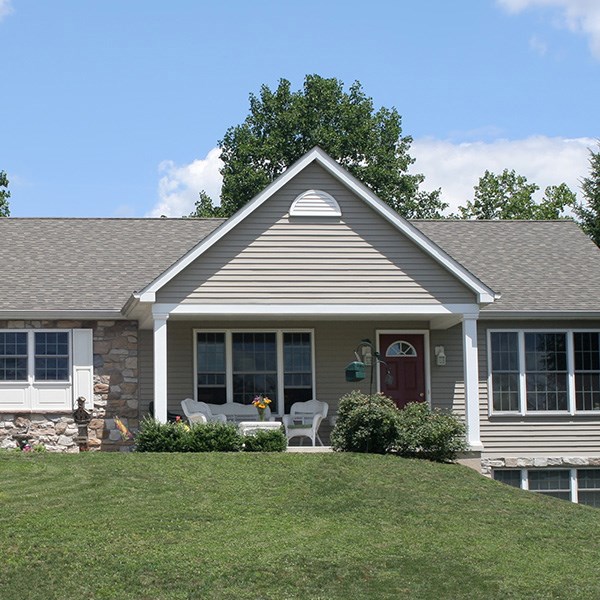 home getting a roofing estimate in medford
