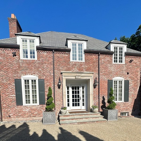 home getting a roofing estimate in Brookline, MA