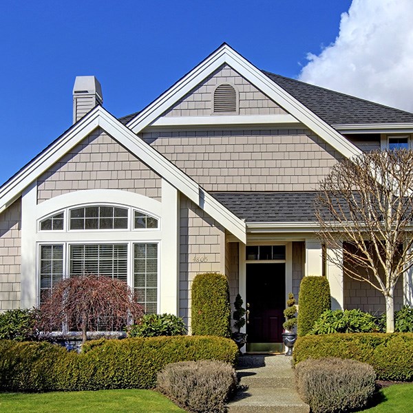 home getting a roofing estimate in needham